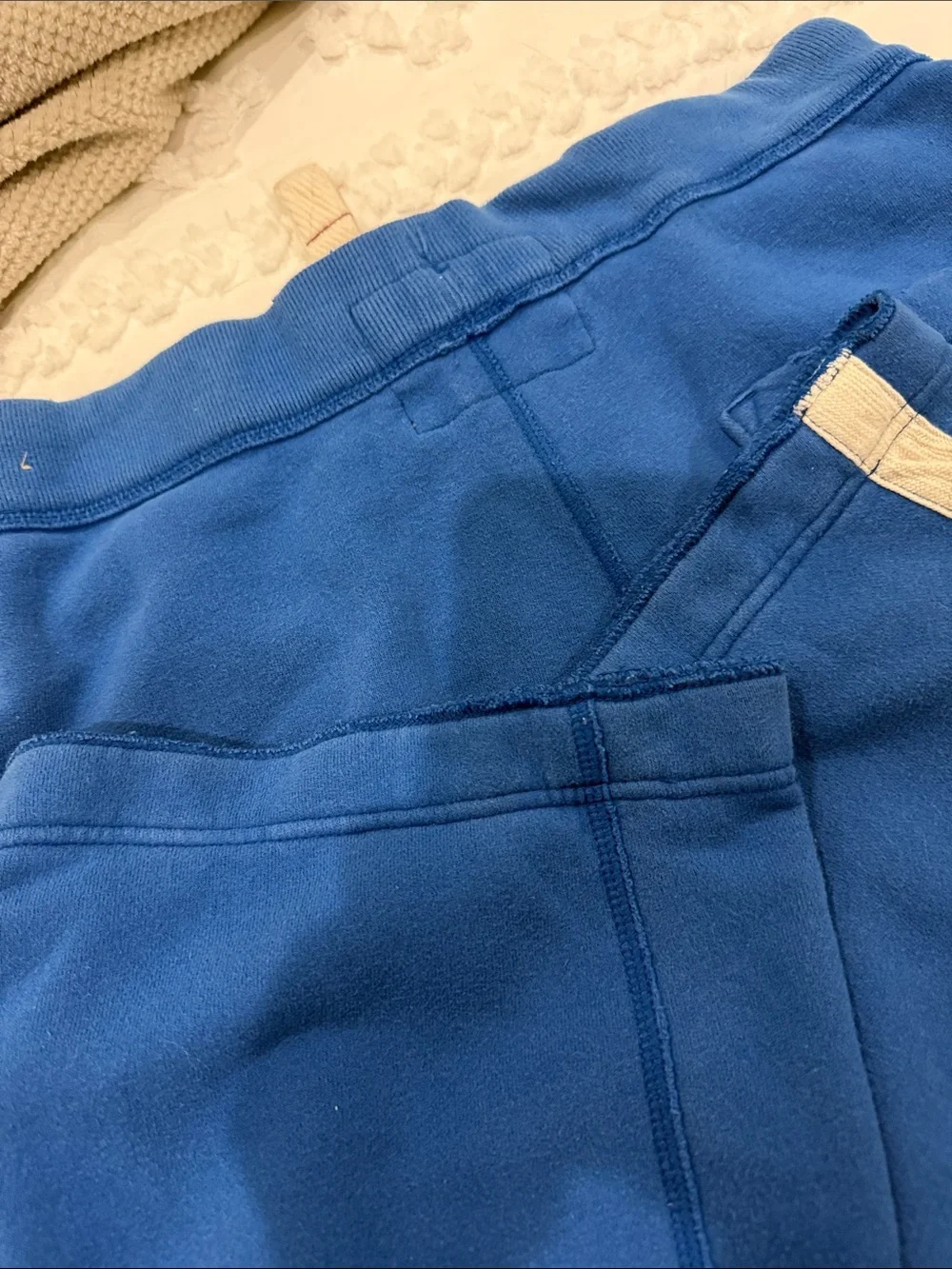 Holister draw waist fleece pants with 2 side pockets & 1 back pocket; blue